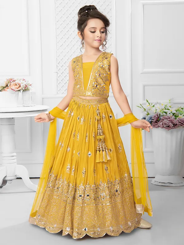 Yellow silk lehenga choli with zari work