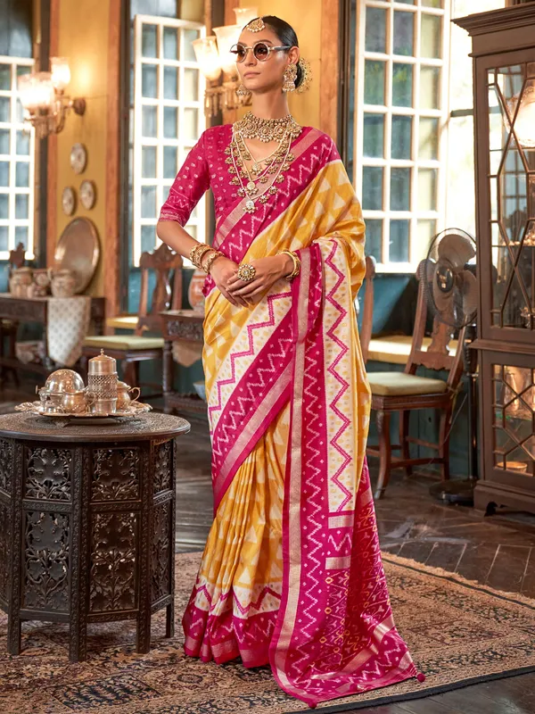 Yellow silk printed saree with zari work