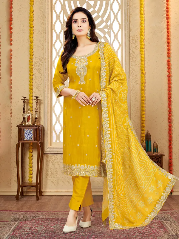 Yellow silk salwar suit with resham and zardosi glow