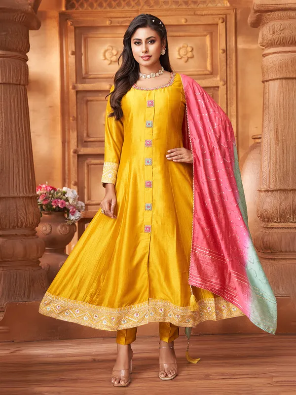 Yellow silk salwar suit with shaded dupatta