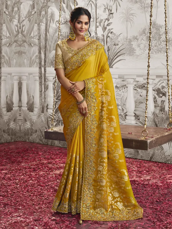 Yellow silk saree with embroidery work
