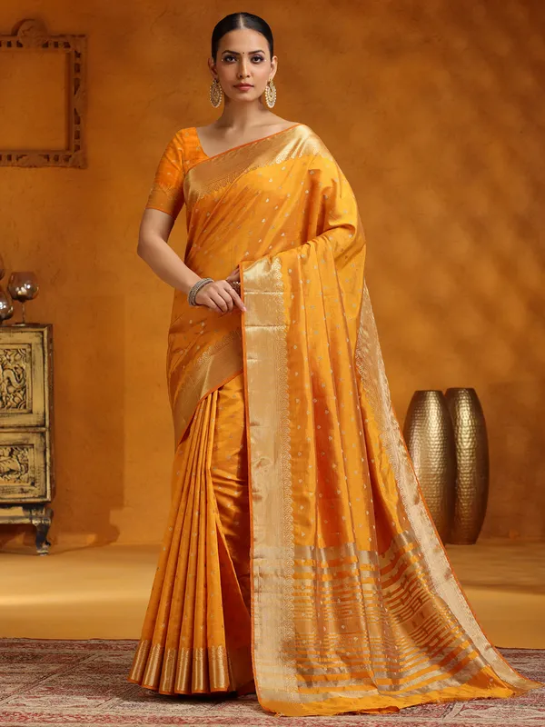 Yellow silk saree with stunning zari work