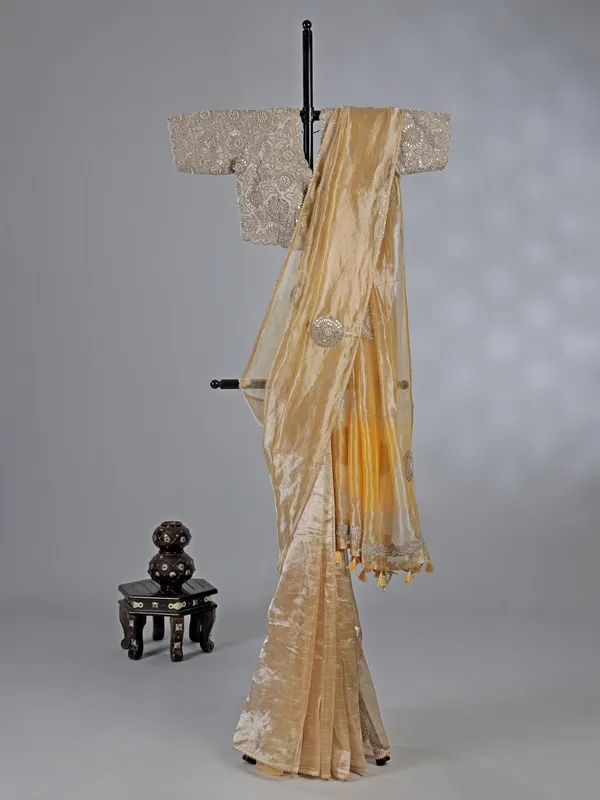 Yellow tissue silk saree with festive glow