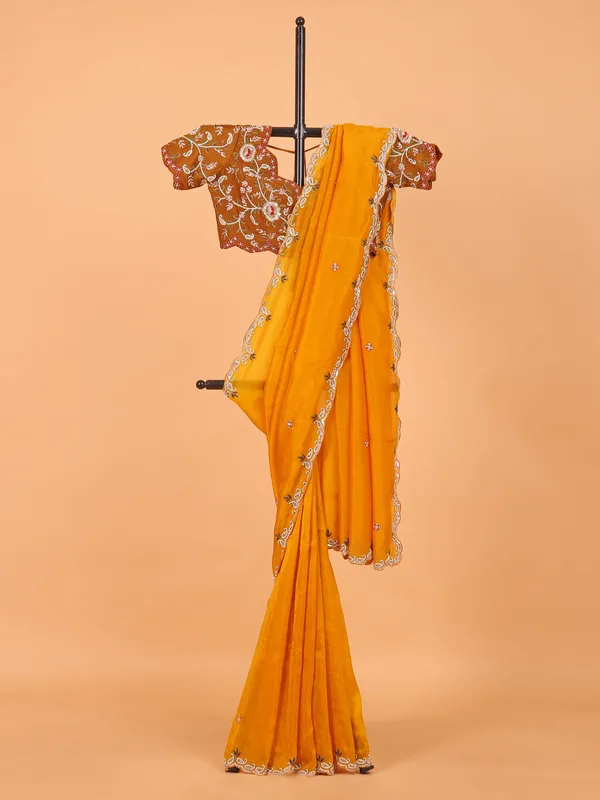 Yellow wedding wear tissue silk saree