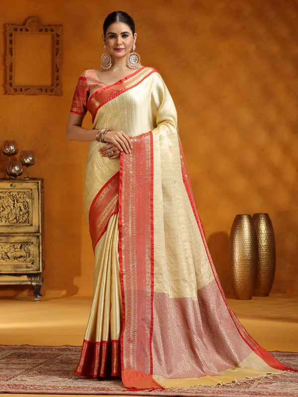 Zari worked beige silk saree
