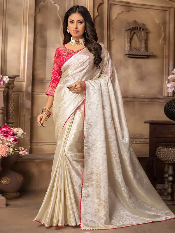 Elegant cream tissue silk saree