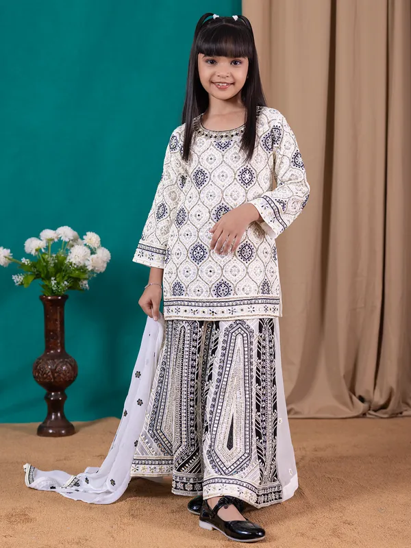 Fascinating cream and black palazzo salwar suit