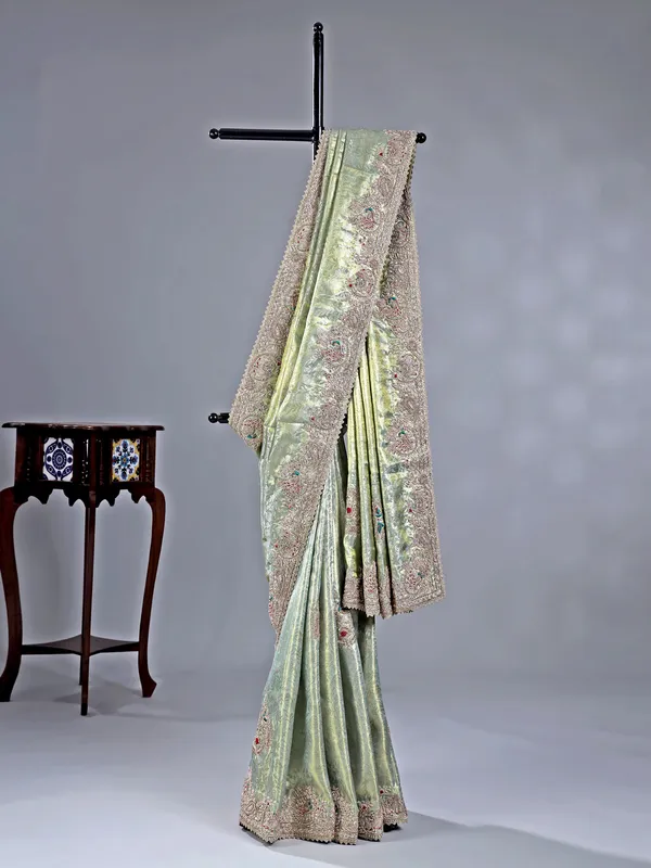 Pista green kanjivaram saree with grand embroidery