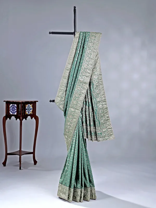 Green kanjivaram saree with wedding embellishments