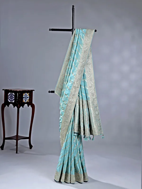 Aqua shimmer silk saree with pearl accents