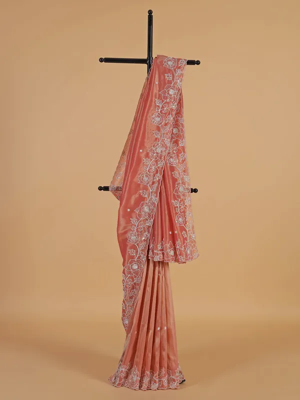 Stunning peach tissue silk saree