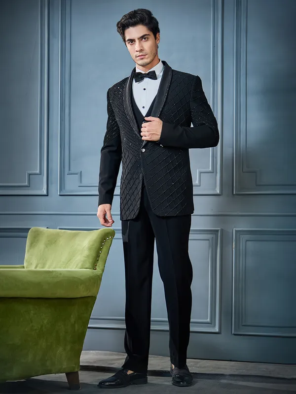 black suit with teal tie