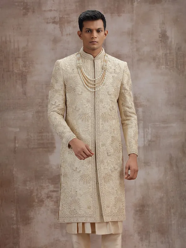 Gold art silk peshwai sherwani with dupatta for