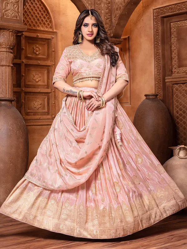 Peach Lehenga Choli with Antique Gold Potli and Meenakari Pearl Necklace Set - Rental