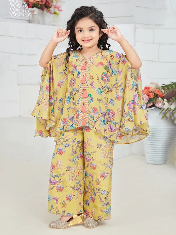 Mustard cotton floral printed co-ord set for women with asymmetrical kurti and straight pants – daily casual wear